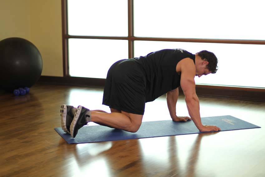 Demonstration of Looking At Ceiling exercise showing proper form and technique