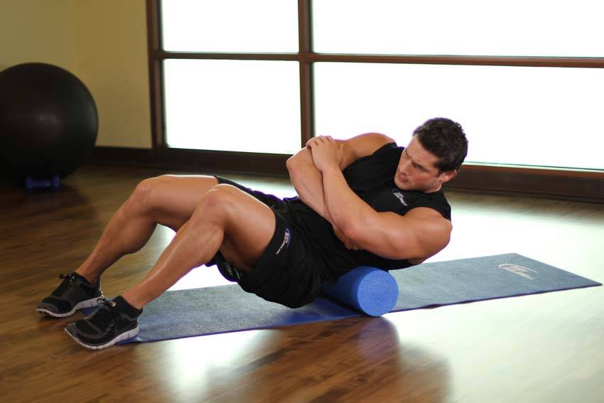 Demonstration of Lower Back-SMR exercise showing proper form and technique
