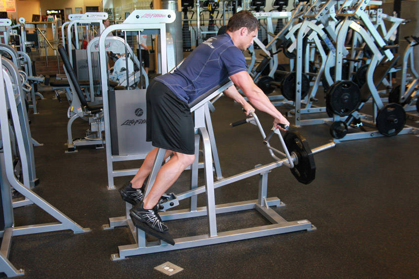 Demonstration of Lying T-Bar Row exercise showing proper form and technique