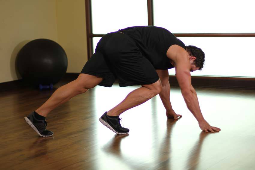 Demonstration of Mountain Climbers exercise showing proper form and technique