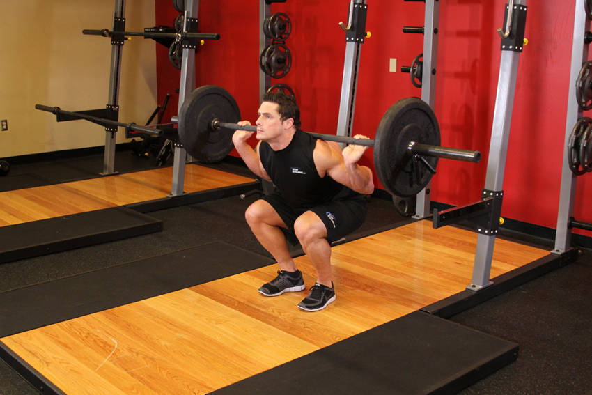 Alternative demonstration of Narrow Stance Squats exercise