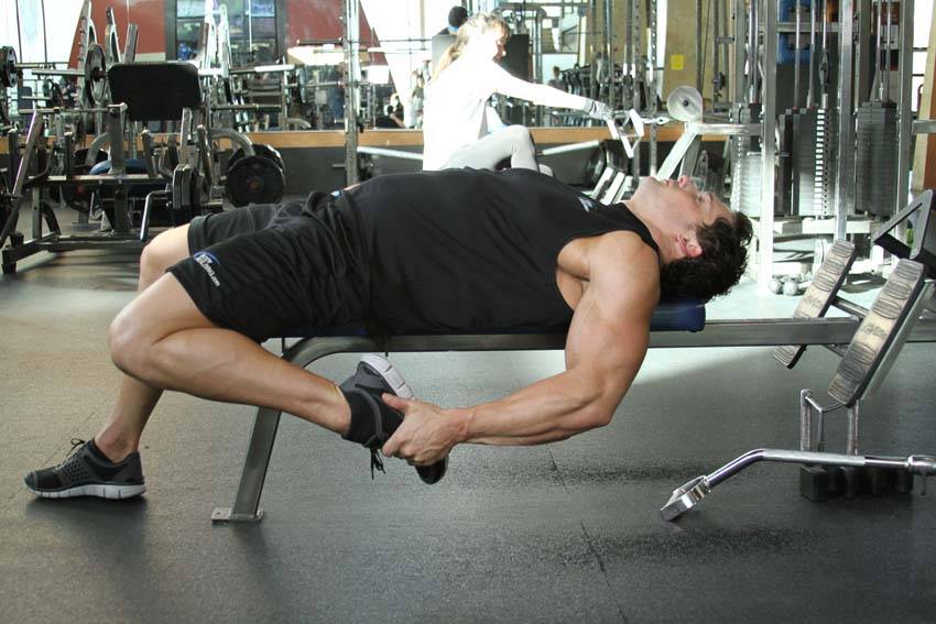 Alternative demonstration of On-Your-Back Quad Stretch exercise
