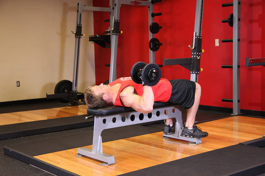 Demonstration of One Arm Dumbbell Bench Press exercise showing proper form and technique