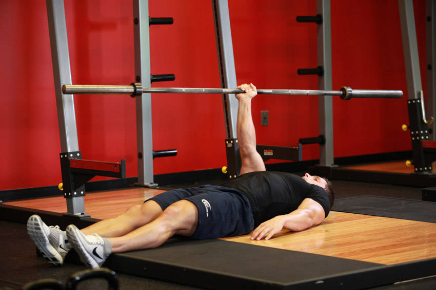 Alternative demonstration of One Arm Floor Press exercise