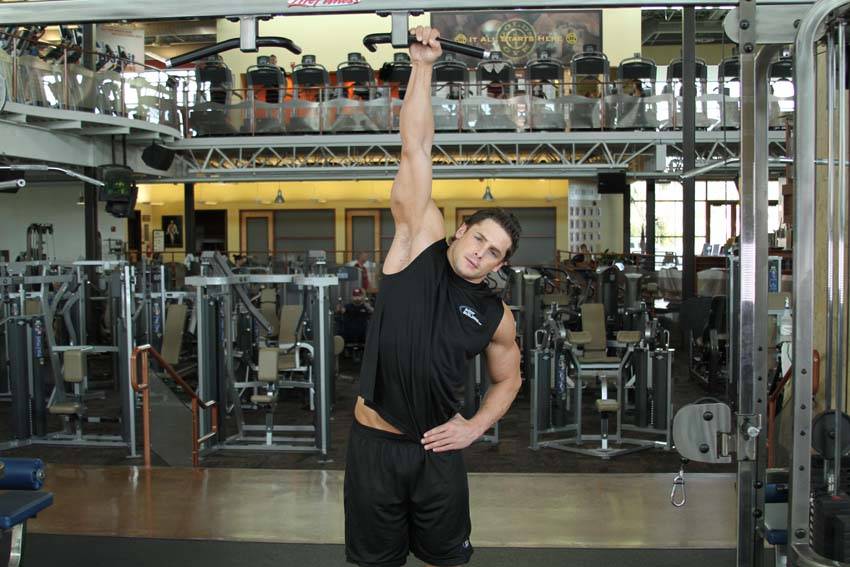 Demonstration of One Handed Hang exercise showing proper form and technique