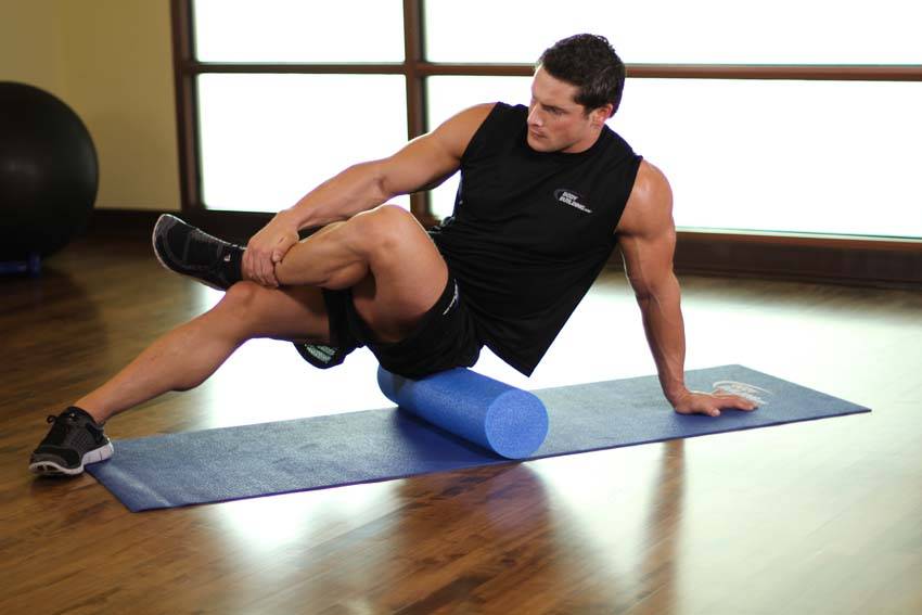 Demonstration of Piriformis-SMR exercise showing proper form and technique