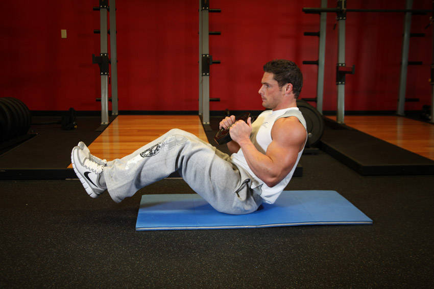 Demonstration of Plate Twist exercise showing proper form and technique