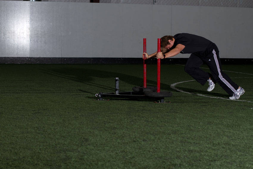 Demonstration of Prowler Sprint exercise showing proper form and technique