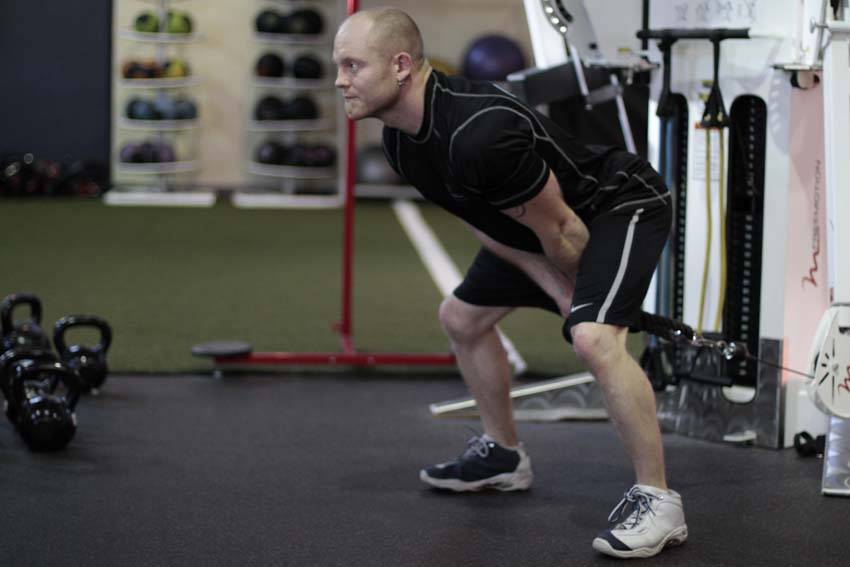 Demonstration of Pull Through exercise showing proper form and technique
