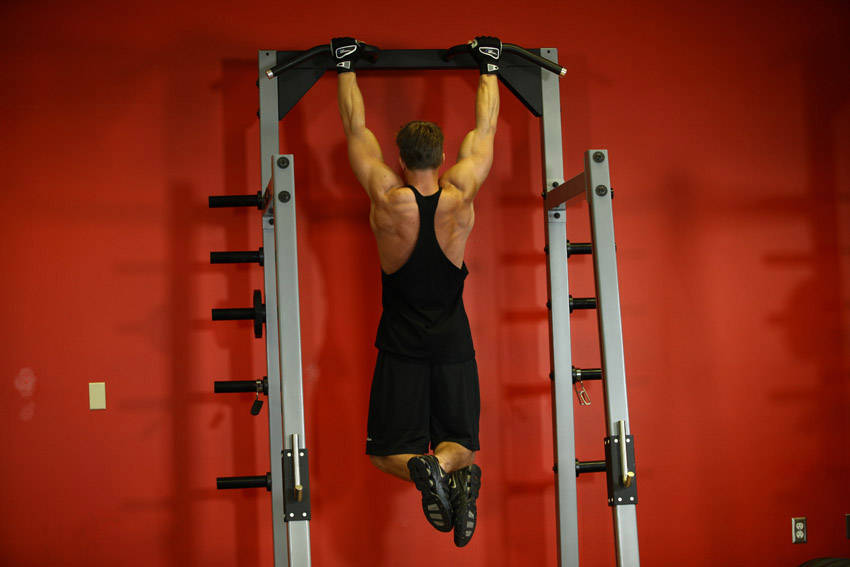 Demonstration of Pullups exercise showing proper form and technique