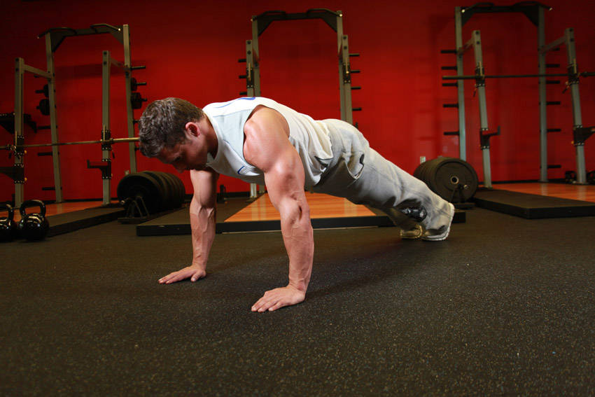 Demonstration of Pushups exercise showing proper form and technique