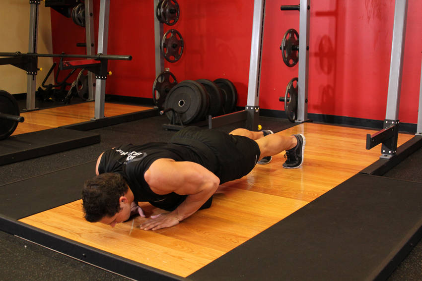 Demonstration of Pushups (Close and Wide Hand Positions) exercise showing proper form and technique
