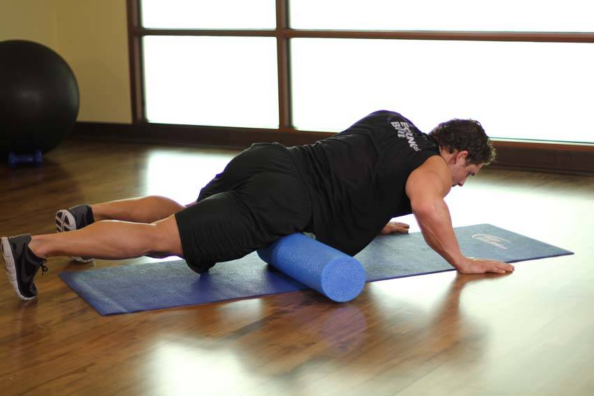 Demonstration of Quadriceps-SMR exercise showing proper form and technique
