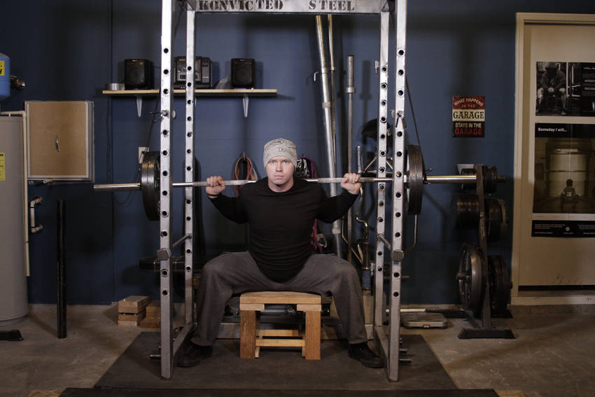 Alternative demonstration of Reverse Band Box Squat exercise
