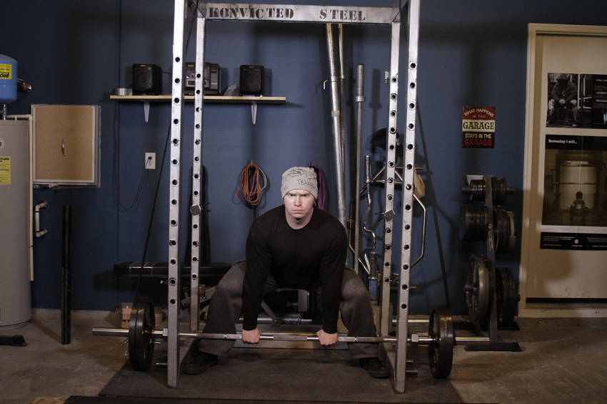 Demonstration of Reverse Band Sumo Deadlift exercise showing proper form and technique