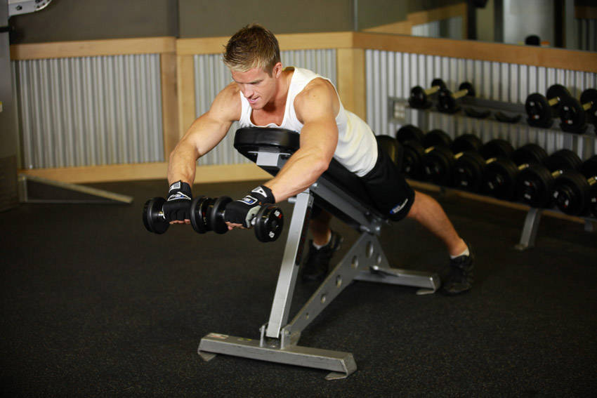 Demonstration of Reverse Flyes With External Rotation exercise showing proper form and technique