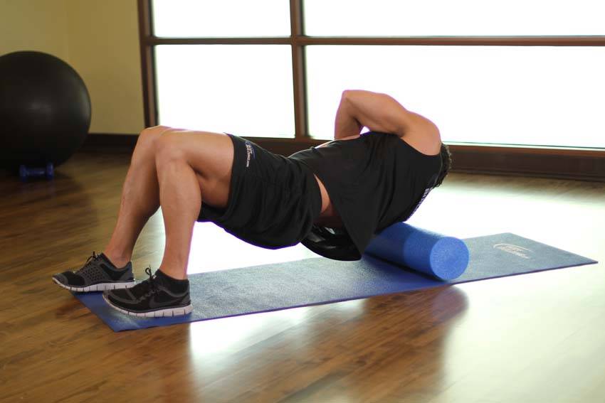Demonstration of Rhomboids-SMR exercise showing proper form and technique