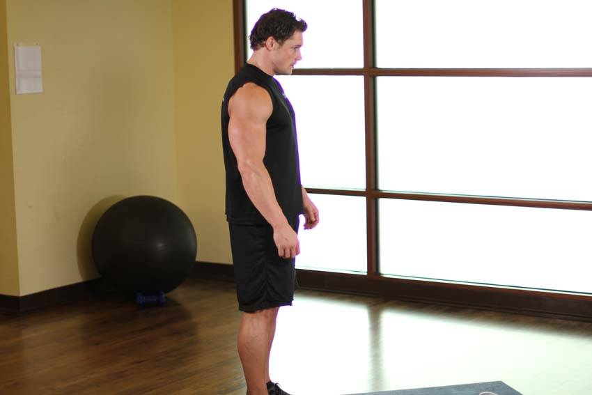 Demonstration of Runner's Stretch exercise showing proper form and technique