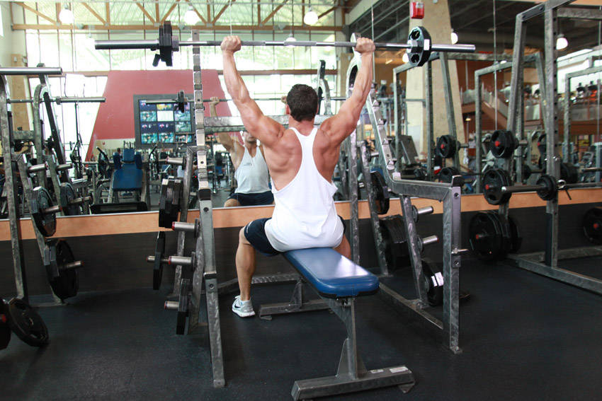 Alternative demonstration of Seated Barbell Military Press exercise