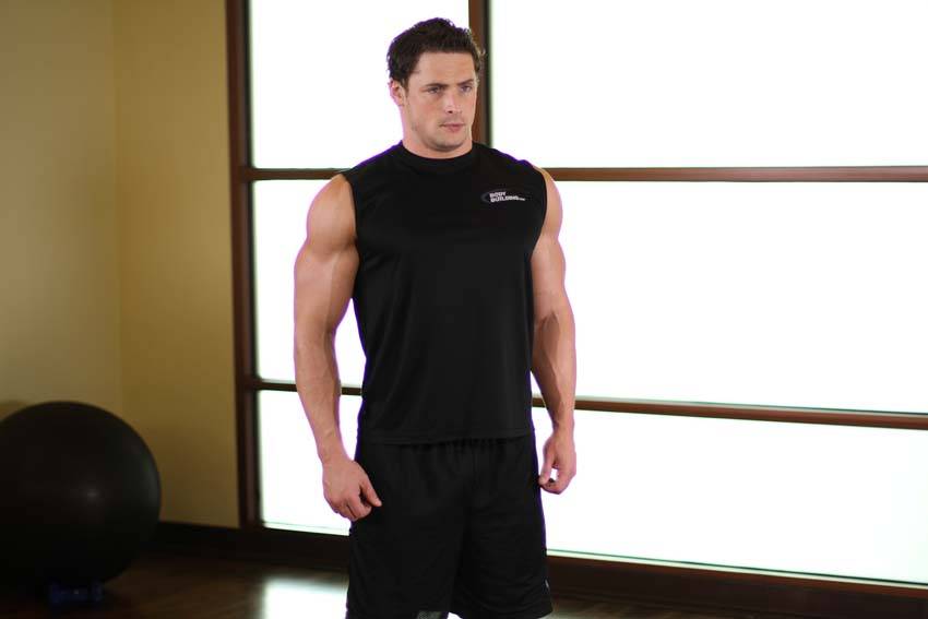 Demonstration of Shoulder Circles exercise showing proper form and technique