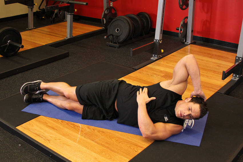 Demonstration of Side Jackknife exercise showing proper form and technique