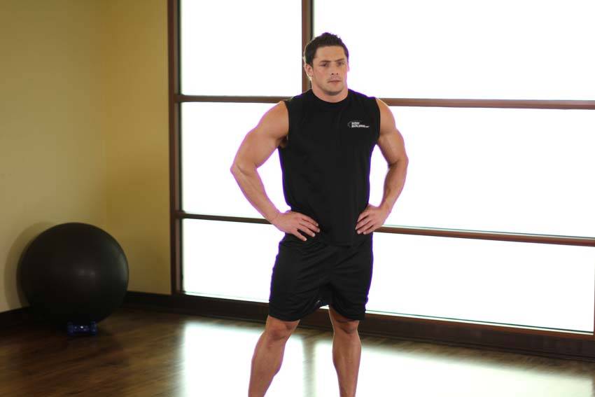 Demonstration of Side Neck Stretch exercise showing proper form and technique