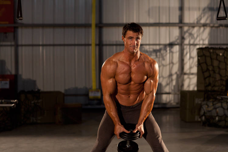 Demonstration of Single Dumbbell Raise exercise showing proper form and technique