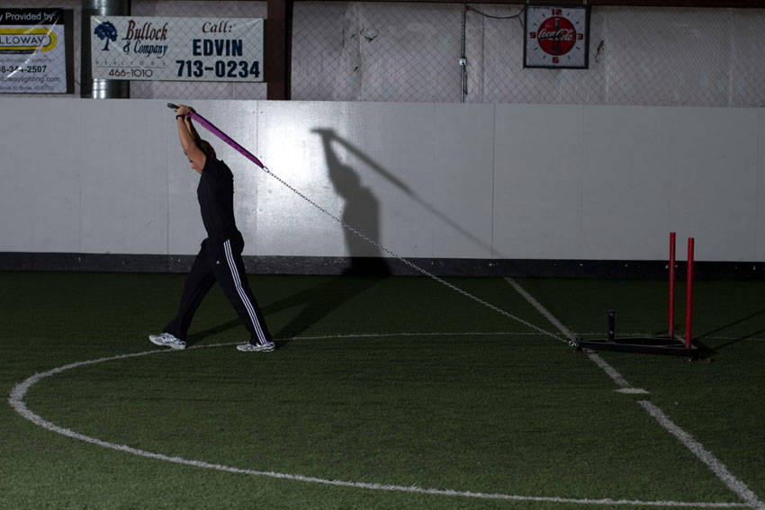 Alternative demonstration of Sled Overhead Triceps Extension exercise
