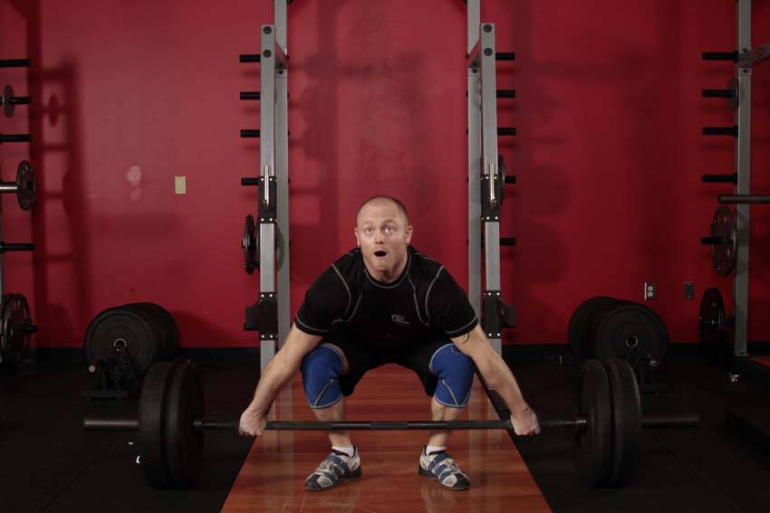 Demonstration of Snatch Deadlift exercise showing proper form and technique