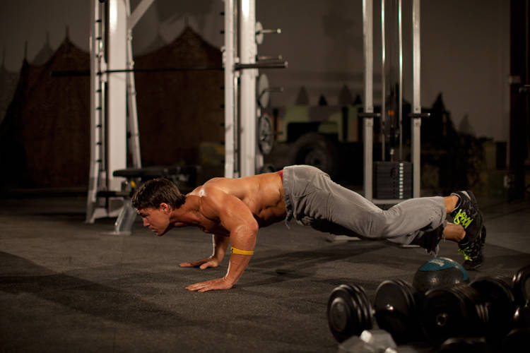 Demonstration of Spider Crawl exercise showing proper form and technique