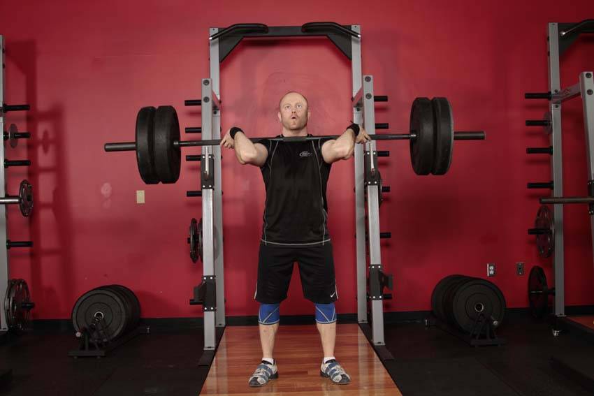 Demonstration of Split Jerk exercise showing proper form and technique