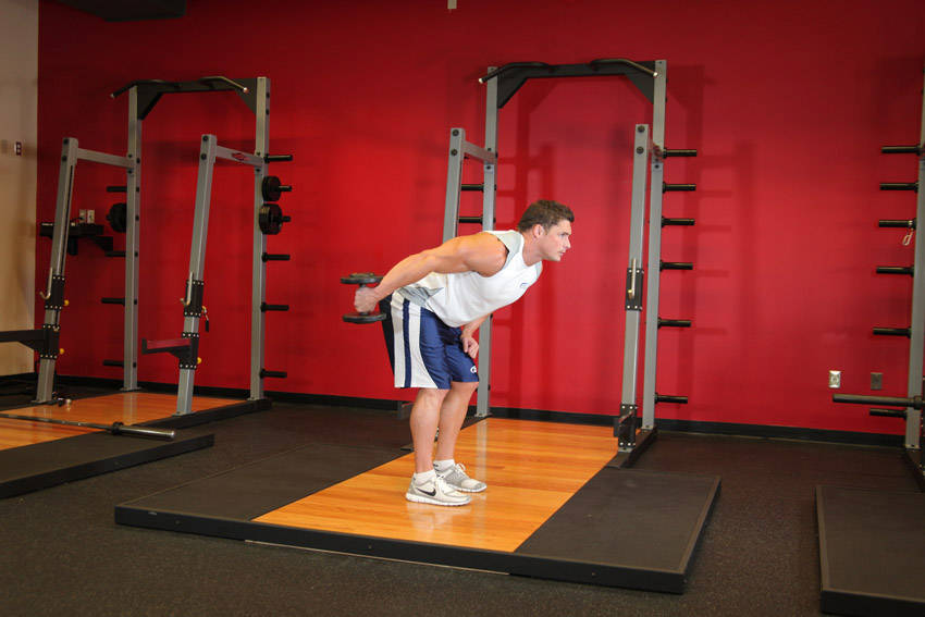 Alternative demonstration of Standing Bent-Over One-Arm Dumbbell Triceps Extension exercise