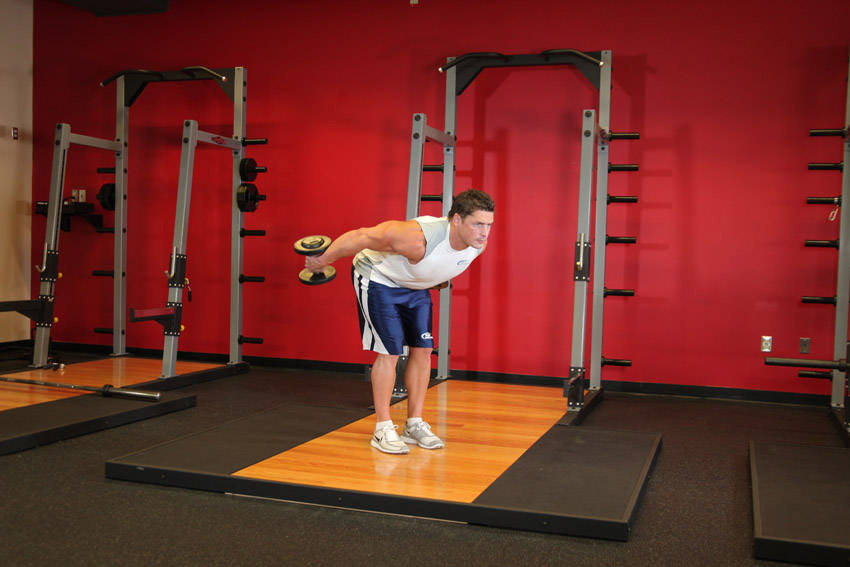 Alternative demonstration of Standing Bent-Over Two-Arm Dumbbell Triceps Extension exercise