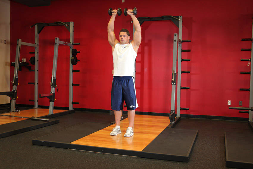 Alternative demonstration of Standing Dumbbell Straight-Arm Front Delt Raise Above Head exercise