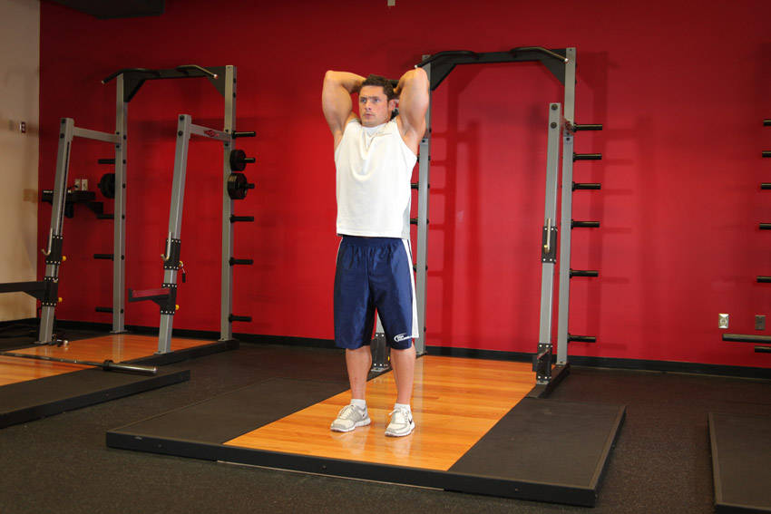 Alternative demonstration of Standing Dumbbell Triceps Extension exercise