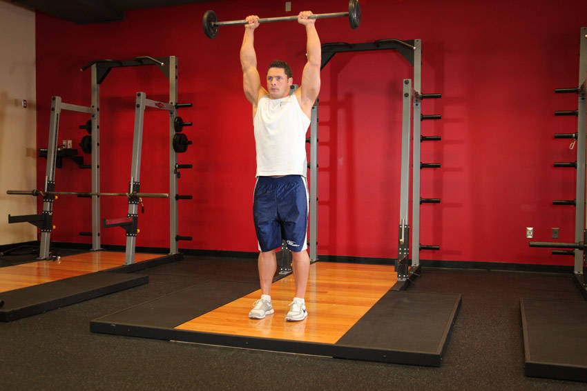 Alternative demonstration of Standing Front Barbell Raise Over Head exercise