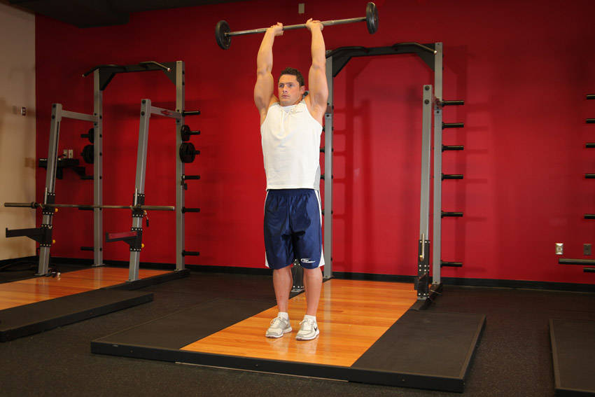 Alternative demonstration of Standing Overhead Barbell Triceps Extension exercise