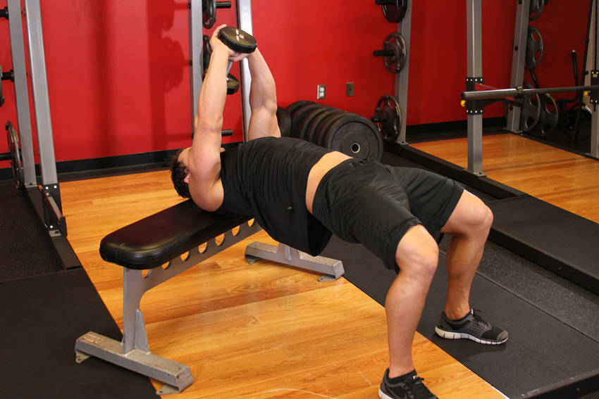 Demonstration of Straight-Arm Dumbbell Pullover exercise showing proper form and technique
