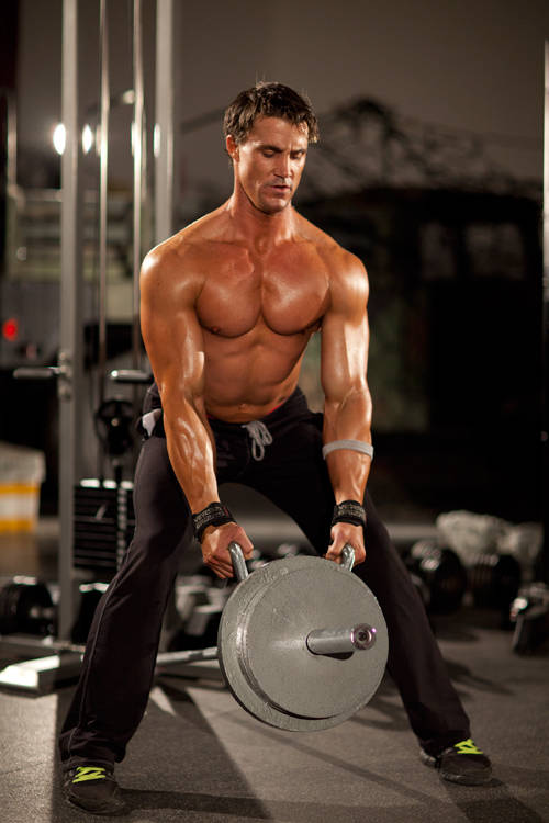 Demonstration of T-Bar Row with Handle exercise showing proper form and technique
