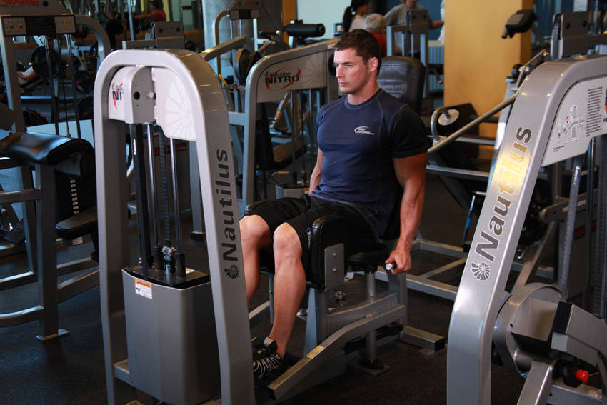 Demonstration of Thigh Abductor exercise showing proper form and technique
