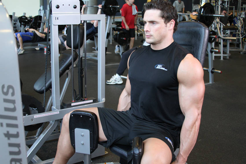 Demonstration of Thigh Adductor exercise showing proper form and technique