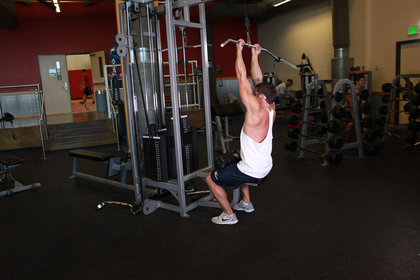 Demonstration of Underhand Cable Pulldowns exercise showing proper form and technique