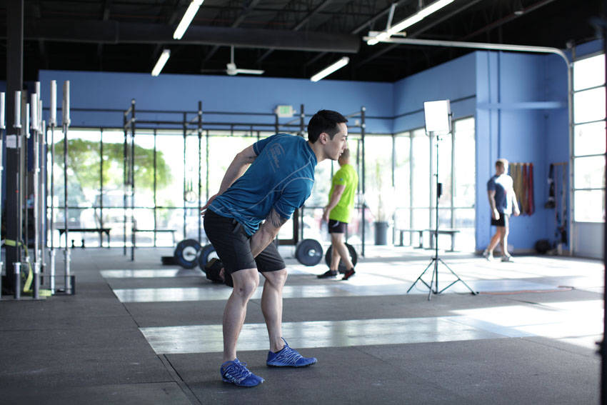 Demonstration of Vertical Swing exercise showing proper form and technique