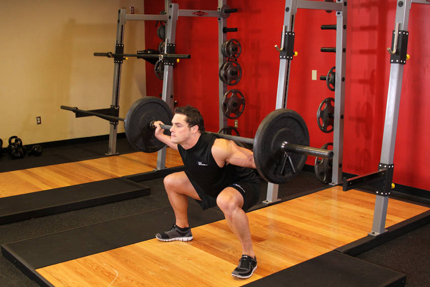 Alternative demonstration of Wide Stance Barbell Squat exercise