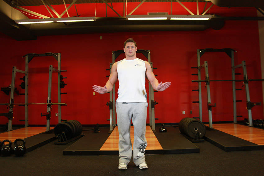 Demonstration of Wrist Circles exercise showing proper form and technique