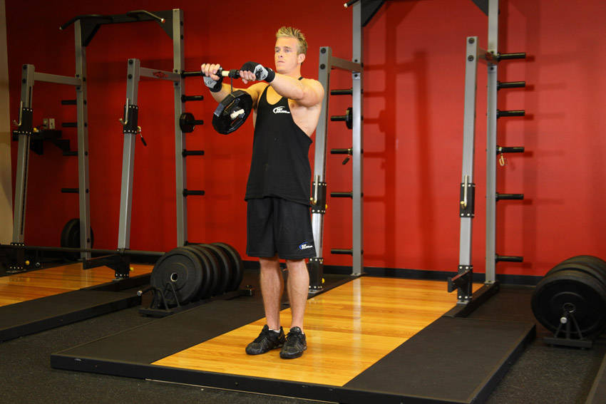 Demonstration of Wrist Roller exercise showing proper form and technique